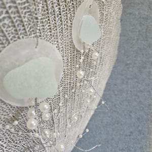 Jellyfish Ornament made with Sea Glass Tinsel String and String Pearls on a Capiz Shell