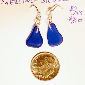 Earrings: Cobalt blue sea glass on sterling silver plated rings
