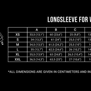 May include: Black and white graphic showing long sleeve shirt measurements. The text "LONGSLEEVE FOR WOMEN" is at the top. Measurements are in centimeters and inches, including neckline, sleeve length, and length.