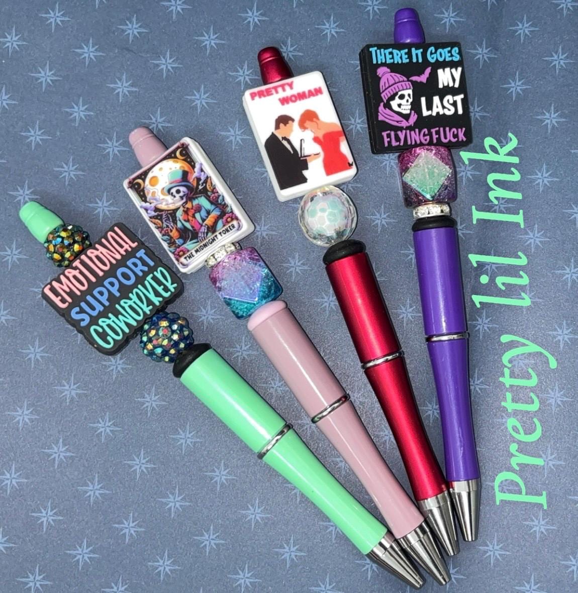Beaded pens with silicone focals. Cute/movie theme/sarcasm