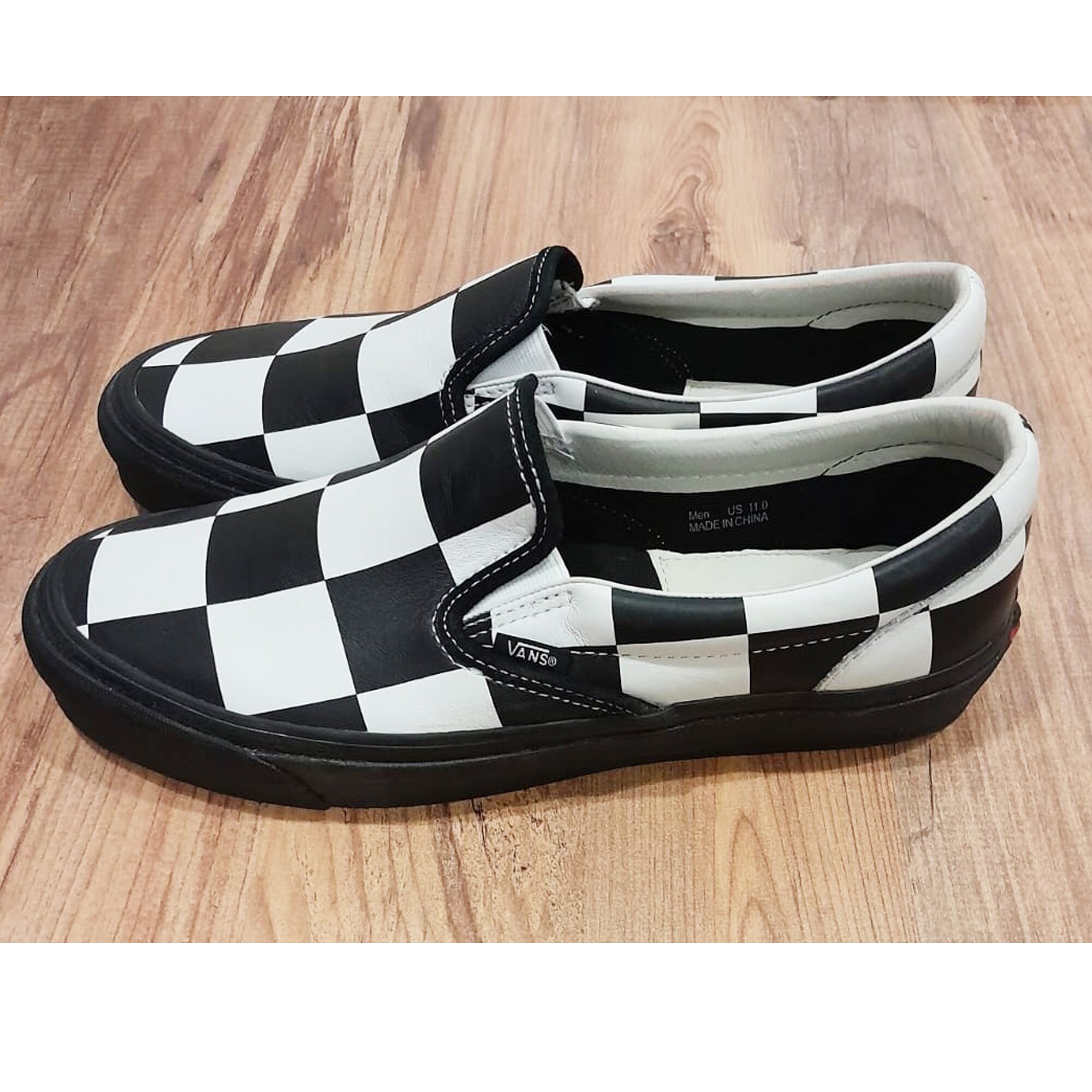 Exclusive Checkerboard Slip-on Sneakers by Vans X Barneys New York 