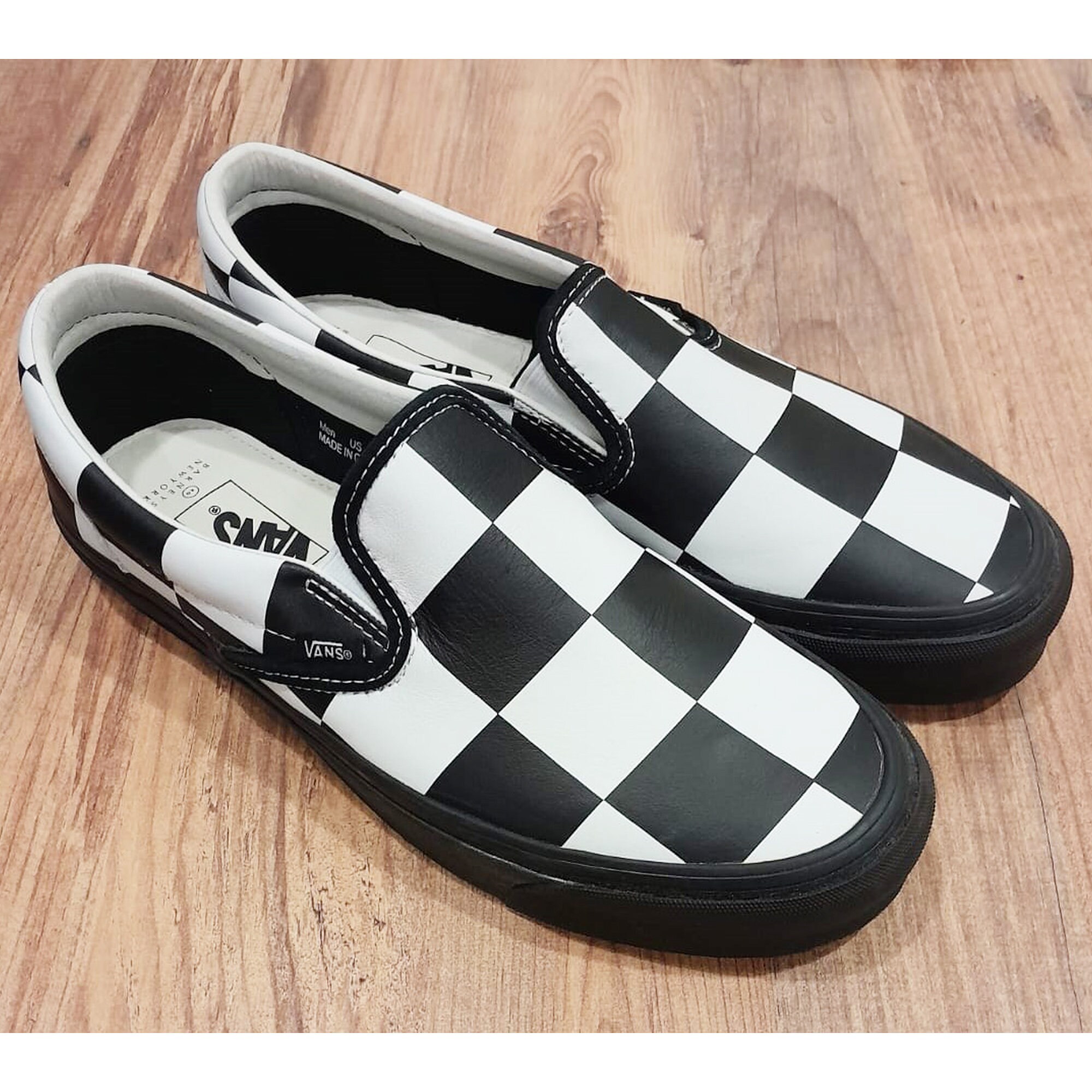 Exclusive Checkerboard Slip-on Sneakers by Vans X Barneys 