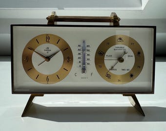 Vintage Swiza 8-day Alarm Clock: Swiss Made Brass Travel Clock