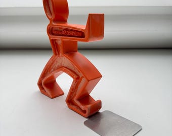 James Orange Bookend – Modern Designer Bookend Figure – Quirky Plastic Shelf Decor – 2012 Contemporary Design
