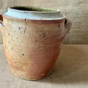 An Antique French glazed stoneware rustic pot à graisse