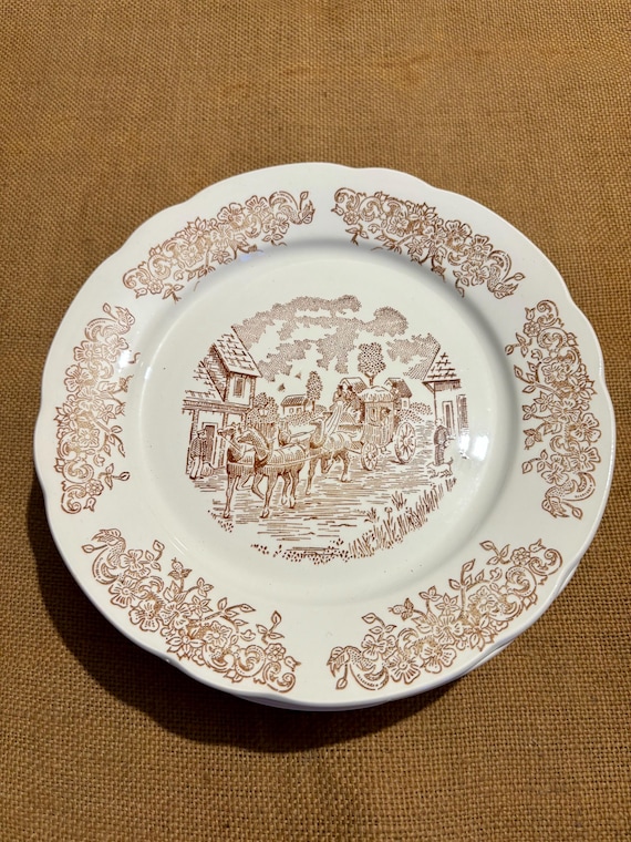 A Set of Six Matching Sarreguemines Plates With Brown and White