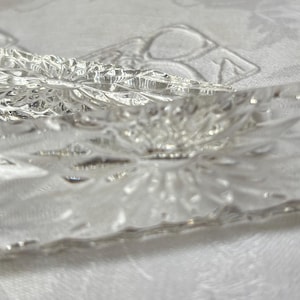 A pair of beautiful cut crystal knife rest