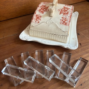 A wonderful vintage set 16 crystal knife rests