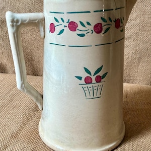 A vintage French Pitchet Jug in the Pommeraie pattern
