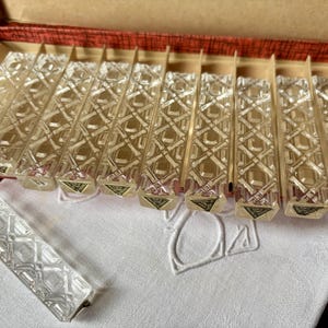 Set of 11 vintage French crystal knife rests in original box