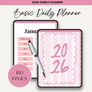 May include: A pink 2026 yearly planner with the text "Basic Daily Planner". The planner has a pink cover with the numbers "20 26" and a pink circle with "120 PAGES". A white pen rests on the planner.