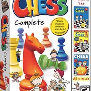 Peut inclure: Une boîte du logiciel "Fritz & Chesster's CHESS Complete". La boîte présente des pièces d'échecs colorées et des personnages de dessins animés. Le texte sur la boîte indique "Learn the ABCs of CHESS" et "All 3 Inside".
