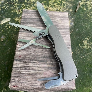 Victorinox 111mm Outrider Custom Scales Titanium