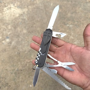 Victorinox Hustman: Custom Titanium Scales, Crusader Shield