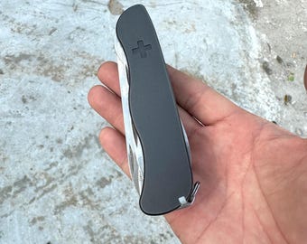Victorinox 111mm Outrider Custom Scales Titanium, Black Stone Wash Color
