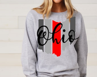 May include: Gray sweatshirt with a red and gray outline of the state of Ohio and the word "Ohio" in black script.