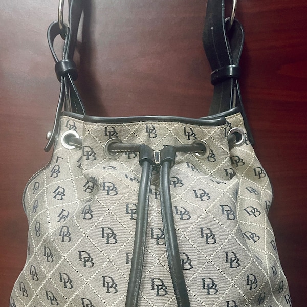 Dooney & Bourke Monogram Drawstring Bucket Tote Bag