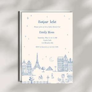May include: A blue and white baby shower invitation with a Parisian theme. The invitation features a sketch of the Eiffel Tower, the Louvre, and other Parisian landmarks. The text on the invitation reads "Bonjour bebe" and includes the details for the baby shower, including the date, time, location, and RSVP information.