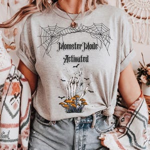 Momster Mode Activated Skeleton Hand Tee | Halloween Summerween, Mushrooms & Spiderwebs