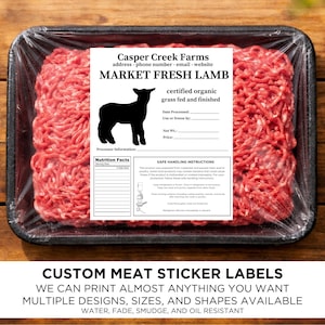 May include: A package of fresh ground lamb in a black tray, sealed with clear plastic wrap. The label reads "Market Fresh Lamb" with a silhouette of a lamb. The label also includes "certified organic grass fed and finished". The bottom of the image reads "Custom Meat Sticker Labels".