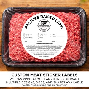 May include: A package of raw ground lamb in a black tray, wrapped in clear plastic. A circular label reads "Pasture Raised Lamb" with a farm logo. The label includes checkboxes for cuts and safe handling instructions. Text at the bottom says "Custom Meat Sticker Labels".