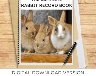 May include: A spiral-bound record book titled THE COMPLETE RABBIT RECORD BOOK featuring a photograph of three brown and white rabbits. A black pen rests on the cover. The text below the book reads DIGITAL DOWNLOAD VERSION 111 FULL PAGES CUSTOMIZABLE.