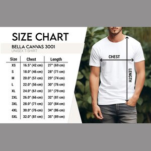 May include: A white Bella Canvas 3001 unisex t-shirt is shown with a size chart. The chart lists sizes XS to 5XL, with chest measurements from 16.5 inches (42 cm) to 32 inches (81 cm), and lengths from 27 inches (69 cm) to 35 inches (89 cm).