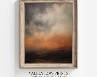 Peut inclure: Une peinture numérique d'un paysage avec un ciel nuageux et un coucher de soleil orange brumeux au-dessus d'une étendue d'eau. La peinture est encadrée dans un cadre en bois clair.