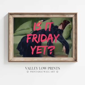 Puede incluir: Una impresión enmarcada de una pintura de una mujer tumbada en un sofá con el texto "Is it Friday yet?" en letras rosas.
