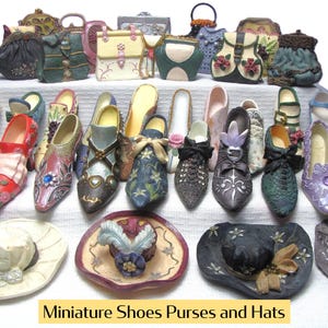 May include: A collection of miniature decorative shoes, purses, and hats arranged on tiered shelves. The items feature various colors, patterns, and embellishments including flowers, bows, and jewels. The text 'Miniature Shoes Purses and Hats' is visible at the bottom.