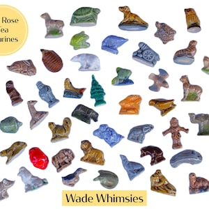Wade Whimsies vintage miniature Red Rose tea figurines made in Staffordshire, England by Wade Ceramics. Featuring mini porcelain animals and various characters introduced as a promotion inside boxes of Red Rose Tea. Launched in 1954 throughout the UK with later launches in Canada and USA. Sizes are approximately 1-2 inches high. These whimsical, nostalgic figurines are in good vintage condition and highly collectible.