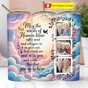 May include: A personalized tumbler with a straw, featuring a design with a sky and cloud background. The tumbler has a memorial quote and space for photos. The design includes the text "May the winds of Heaven blow softly and..."