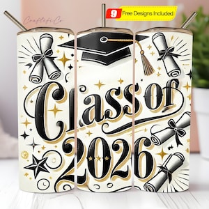 May include: A graduation-themed tumbler with a straw, featuring the text "Class of 2026" in black and gold. The design includes graduation caps, diplomas, and stars on a cream background. The tumbler is designed for cold beverages.