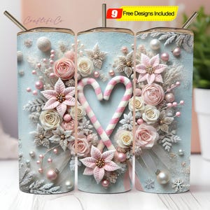 May include: A set of three 20 oz. insulated tumblers with a winter floral design. The design features pink and white flowers, pearls, and a candy cane heart on a light blue background. Each tumbler has a silver straw.