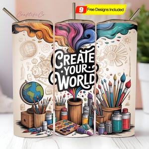 May include: A white tumbler with a colorful design featuring paintbrushes, paint, and the words "Create Your World." The design includes a globe, art supplies, and a straw. The tumbler has a silver straw and a lid.