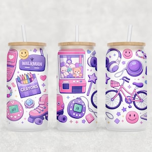 May include: Three glass tumblers with bamboo lids and straws, each decorated with colourful, cartoon-style illustrations. Designs include a Walkman, roller skates, a claw machine, a bicycle, and other nostalgic icons. The tumblers are perfect for cold drinks.