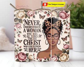 May include: A floral tumbler featuring the text "Never Underestimate a Woman Who Does All Things Through Christ Who Strengthens Her." The design includes a portrait of a woman with glasses and a leopard print headband, surrounded by roses and butterflies.