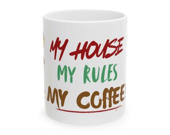 May include: White ceramic coffee mug with the text "MY HOUSE MY RULES MY COFFEE!" in red, green, and brown lettering. The mug has a glossy finish and a standard handle.