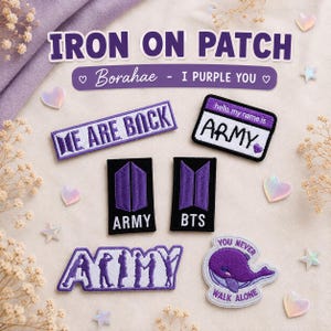 May include: A collection of six purple and white embroidered iron-on patches featuring text and graphics. Designs include the phrases WE ARE BACK, hello my name is ARMY, ARMY, BTS, and YOU NEVER WALK ALONE with a purple whale, plus two logo patches.