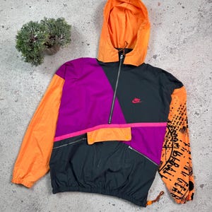Purple and orange nike jacket hotsell