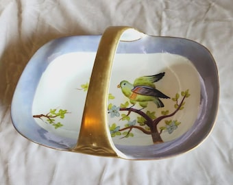 Plato con asa de porcelana brillante con loro pintado a mano de Noritake Morimura, década de 1920