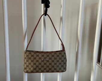 Bolso náutico de pochette vintage de Gucci