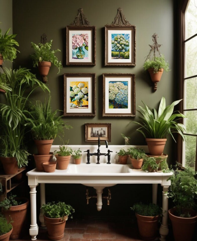 beautiful potting sink with botanical prints above