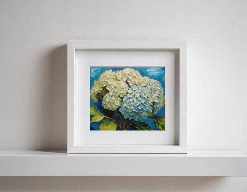 May include: A framed painting of a white and blue hydrangea flower against a blue background.