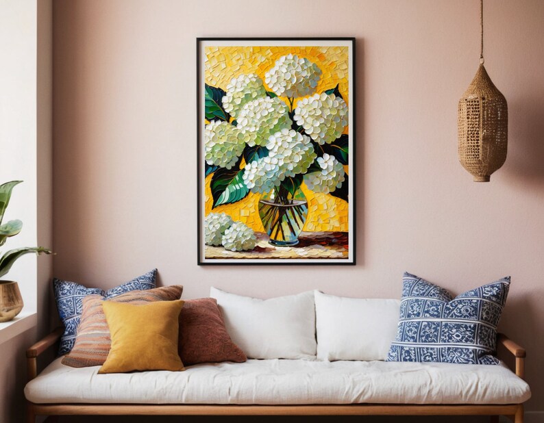 May include: A painting of a bouquet of white hydrangeas in a clear glass vase with a yellow background. The vase is sitting on a table with a green tablecloth.