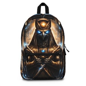 May include: Black backpack featuring a detailed illustration of a deity with glowing blue eyes and intricate gold and bronze armor. The design includes lightning effects and a central blue gem. The backpack has a black handle and a side pocket.