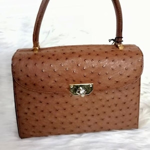 Bueno purses ostrich top