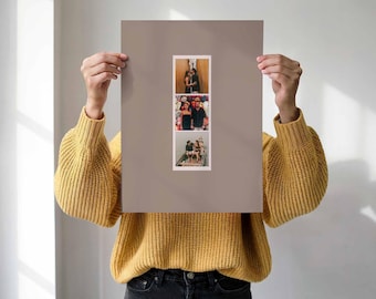 May include: A rectangular taupe-colored print featuring a vertical strip of three distinct photographs. The top photo shows two people standing, the middle photo shows two people posing, and the bottom photo shows two people sitting in a small boat.