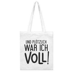 Könnte beinhalten: Weiße Einkaufstasche mit schwarzem Text, der "Und plötzlich war ich voll!" lautet.