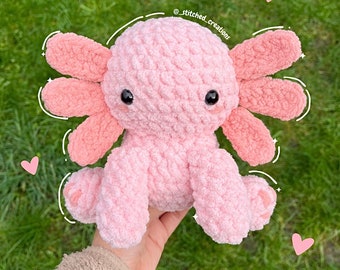 Handmade crochet amigurumi axolotl sitting cute plushie